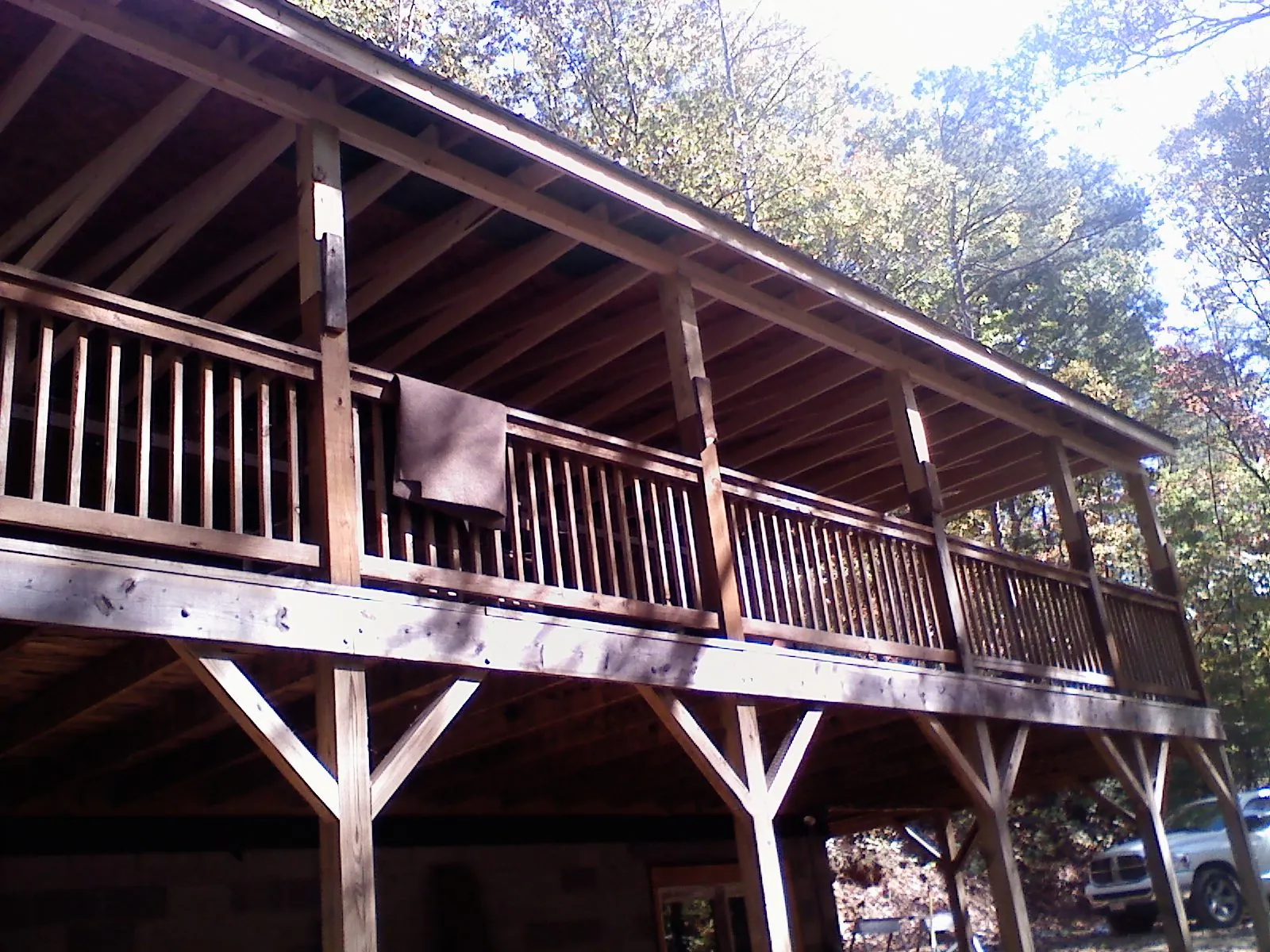 Timber framing under a new elevated porch and deck — Roof Leak Repair in Bloomington Springs by Roofing Brothers
